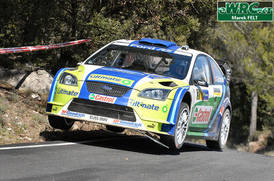 Marcus Grönholm - Timo Rautiainen
42º RallyRACC Catalunya - Costa Daurada 2006. Ford Focus RS WRC '06 (EU55 BMV). Clasificado 3º.
BP Ford World Rally Team

Del 24 al 26 de Marzo, Salou, Tarragona, Catalunya, España.
Superficie: asfalto.

El Rally tenia un total de 1376.14 Km de los que 346.43 Km divididos en 16 tramos eran especiales.

Se inscribieron 71 equipos, tomaron la salida 66, finalizaron 56.

© Marek Felt
@@
Palabras clave: Ford;Focus;WRC;Catalunya;España;Spain;2006