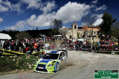 Marcus Grönholm - Timo Rautiainen
42º RallyRACC Catalunya - Costa Daurada 2006. Ford Focus RS WRC '06 (EU55 BMV). Clasificado 3º.
BP Ford World Rally Team

Del 24 al 26 de Marzo, Salou, Tarragona, Catalunya, España.
Superficie: asfalto.

El Rally tenia un total de 1376.14 Km de los que 346.43 Km divididos en 16 tramos eran especiales.

Se inscribieron 71 equipos, tomaron la salida 66, finalizaron 56.

© Petr Lusk
@@
Palabras clave: Ford;Focus;WRC;Catalunya;España;Spain;2006