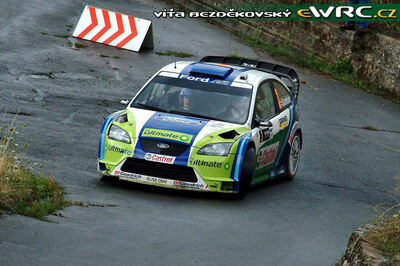 Marcus Grönholm - Timo Rautiainen
25º OMV ADAC Rallye Deutschland 2006. Ford Focus RS WRC '06 (EU55 CNN). Clasificado 3º.
BP Ford World Rally Team

Del 11 al 13 de Agosto, Trier, Rhineland-Palatinate.
Superficie: asfalto.

El Rally constaba de 3 etapas con un total de 1300.48 km de los que 349.11 km divididos en 19 tramos eran cronometrados.

Tomaron la salida 73 equipos, finalizaron 56.

© Vít Bezdekovský
@@
Palabras clave: Ford;Focus;WRC;Alemania;Deutschland;2006