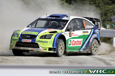 Mikko Hirvonen - Jarmo Lehtinen
6º Rally de Japan 2006. Ford Focus RS WRC '06 (EU55 CNJ). Clasificado 3º.
BP Ford World Rally Team

Del 1 al 3 de Octubre, Obihiro, Hokkaido.
Superficie: tierra.

El Rally constaba de 3 etapas con un total de 1586.52 km de los que 345.72 km divididos en 27 tramos eran cronometrados.

Tomaron la salida 87 equipos, finalizaron 78.

© Dan Vrubel
@@
Palabras clave: Ford;Focus;WRC;Japon;2006