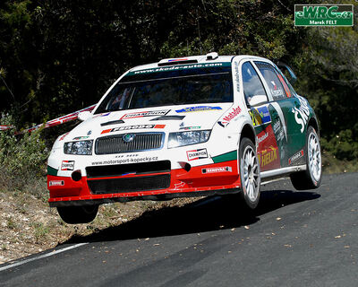 Jan Kopecký - Filip Schovánek
42º RallyRACC Catalunya - Costa Daurada 2006. Skoda Fabia WRC (4S8 9856). Clasificado 5º.
Czech RT Škoda Kopecký

Del 24 al 26 de Marzo, Salou, Tarragona, Catalunya, España.
Superficie: asfalto.

El Rally tenia un total de 1376.14 Km de los que 346.43 Km divididos en 16 tramos eran especiales.

Se inscribieron 71 equipos, tomaron la salida 66, finalizaron 56.

© Marek Felt
@@
Palabras clave: Skoda;Fabia;WRC;Catalunya;España;Spain;2006