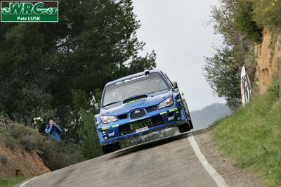 Petter Solberg - Phil Mills
42º RallyRACC Catalunya - Costa Daurada 2006. Subaru Impreza S12 WRC '06 (FT55 SRT). Clasificado 7º.
Subaru World Rally Team

Del 24 al 26 de Marzo, Salou, Tarragona, Catalunya, España.
Superficie: asfalto.

El Rally tenia un total de 1,376.14 Km de los que 346.43 Km divididos en 16 tramos eran especiales.

Se inscribieron 71 equipos, tomaron la salida 66, finalizaron 56.

© Petr Lusk
@@
Palabras clave: Subaru;Impreza;WRC;Catalunya;España;Spain;2006