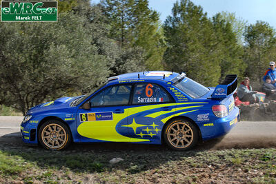Stéphane Sarrazin - Stéphane Prévot
42º RallyRACC Catalunya - Costa Daurada 2006. Subaru Impreza S12 WRC '06 (GT55 SRT). Clasificado 8º.
Subaru World Rally Team

Del 24 al 26 de Marzo, Salou, Tarragona, Catalunya, España.
Superficie: asfalto.

El Rally tenia un total de 1,376.14 Km de los que 346.43 Km divididos en 16 tramos eran especiales.

Se inscribieron 71 equipos, tomaron la salida 66, finalizaron 56.

© Marek Felt
@@
Palabras clave: Subaru;Impreza;WRC;Catalunya;España;Spain;2006