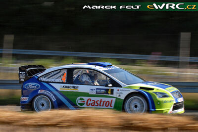 Mikko Hirvonen - Jarmo Lehtinen
25º OMV ADAC Rallye Deutschland 2006. Ford Focus RS WRC '06 (EU55 CNX). Clasificado 9º.
BP Ford World Rally Team

Del 11 al 13 de Agosto, Trier, Rhineland-Palatinate.
Superficie: asfalto.

El Rally constaba de 3 etapas con un total de 1300.48 km de los que 349.11 km divididos en 19 tramos eran cronometrados.

Tomaron la salida 73 equipos, finalizaron 56.

© Marek Felt
@@
Palabras clave: Ford;Focus;WRC;Alemania;2006