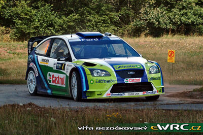 Mikko Hirvonen - Jarmo Lehtinen
25º OMV ADAC Rallye Deutschland 2006. Ford Focus RS WRC '06 (EU55 CNX). Clasificado 9º.
BP Ford World Rally Team

Del 11 al 13 de Agosto, Trier, Rhineland-Palatinate.
Superficie: asfalto.

El Rally constaba de 3 etapas con un total de 1300.48 km de los que 349.11 km divididos en 19 tramos eran cronometrados.

Tomaron la salida 73 equipos, finalizaron 56.

© Vít Bezdekovský
@@
Palabras clave: Ford;Focus;WRC;Alemania;2006