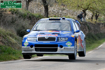 Gilles Panizzi - Hervé Panizzi
42º RallyRACC Catalunya - Costa Daurada 2006. Skoda Fabia WRC (4S5 3382). Clasificado 10º.
Red Bull Skoda

Del 24 al 26 de Marzo, Salou, Tarragona, Catalunya, España.
Superficie: asfalto.

El Rally tenia un total de 1,376.14 Km de los que 346.43 Km divididos en 16 tramos eran especiales.

Se inscribieron 71 equipos, tomaron la salida 66, finalizaron 56.

© Marek Felt
@@
Palabras clave: Skoda;Fabia;WRC;Catalunya;España;Spain;2006