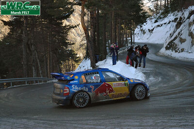 Gilles Panizzi - Hervé Panizzi
74º Rallye Automobile de Monte-Carlo 2006. Skoda Fabia WRC (4S5 3382). Clasificado 10º.
Red Bull Skoda

Del 20 al 22 de Enero, Monaco.
Superficie: asfalto - nieve.

El Rally tenia un total de 1294.89 Km de los que 366.39 km divididos en 18 tramos eran especiales, (2 de ellas fueron canceladas SS3 Pierlas - Ilonse 1 de 23.22 Km y SS11 La Tour sur Tinee - Utelle 2 de 18.73 Km).

Se inscribieron 53 equipos, tomaron la salida 51, finalizaron 43.

© Marek Felt
@@
Palabras clave: Skoda;Fabia;WRC;Montecarlo;2006