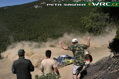 Chris Atkinson - Glenn Macneall
53º BP Ultimate Acropolis Rally of Greece 2006. Subaru Impreza S12 WRC '06 (GT55 SRT). Clasificado 11º.
Subaru World Rally Team

Del 2 al 4 de Junio, Athens.
Superficie: tierra.

El Rally constabade 3 etapas con un tenia un total de 1279.29 km de los que 355.62 km divididos en 18 tramos eran cronometrados.

Se inscribieron 91 equipos, tomaron la salida 84, finalizaron 69.

© Petr Sagner
@@
Palabras clave: Subaru;Impreza;WRC;Grecia;Atenas;Acropolis;2006