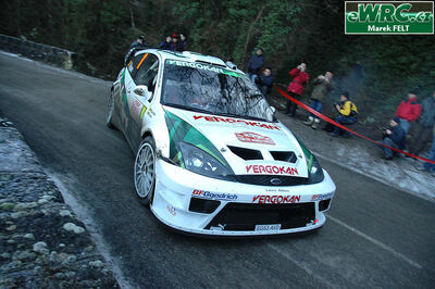 Pieter Tsjoen - Eddy Chevaillier
74º Rallye Automobile de Monte-Carlo 2006. Ford Focus RS WRC '04 (EG53 AVD). Clasificado 14º.
Stobart VK Ford Rally Team

Del 20 al 22 de Enero, Monaco.
Superficie: asfalto - nieve.

El Rally tenia un total de 1294.89 Km de los que 366.39 km divididos en 18 tramos eran especiales, (2 de ellas fueron canceladas SS3 Pierlas - Ilonse 1 de 23.22 Km y SS11 La Tour sur Tinee - Utelle 2 de 18.73 Km).

Se inscribieron 53 equipos, tomaron la salida 51, finalizaron 43.

© Marek Felt
@@
Palabras clave: Ford;Focus;WRC;Montecarlo;2006