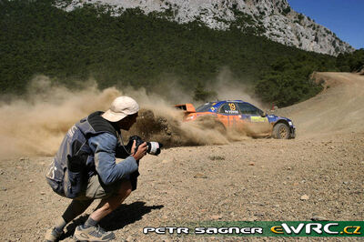 Armodios Vovos - "El-Em"
53º BP Ultimate Acropolis Rally of Greece 2006. Subaru Impreza S11 WRC '05 (LC54 WRC). Clasificado 14º.

Del 2 al 4 de Junio, Athens.
Superficie: tierra.

El Rally constabade 3 etapas con un tenia un total de 1279.29 km de los que 355.62 km divididos en 18 tramos eran cronometrados.

Se inscribieron 91 equipos, tomaron la salida 84, finalizaron 69.

© Petr Sagner
@@
Palabras clave: Subaru;Impreza;WRC;Atenas;Grecia;Acropolis;2006