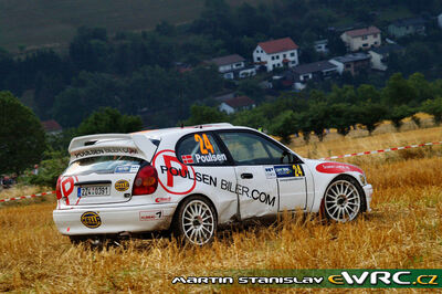 Kristian Poulsen - Ole Refsgaard Frederiksen
25º OMV ADAC Rallye Deutschland 2006. Toyota Corolla WRC (2Z4 0391). Clasificado 15º.

Del 11 al 13 de Agosto, Trier, Rhineland-Palatinate.
Superficie: asfalto.

El Rally constaba de 3 etapas con un total de 1300.48 km de los que 349.11 km divididos en 19 tramos eran cronometrados.

Tomaron la salida 73 equipos, finalizaron 56.

© Martin Stanislav
@
Palabras clave: Toyota;Corolla;WRC;Alemania