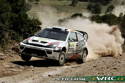 Kosti Katajamäki - Timo Alanne
53º BP Ultimate Acropolis Rally of Greece 2006. Ford Focus RS WRC '04 (EF04 WBW). Clasificado 26º.
Stobart VK Ford Rally Team

Del 2 al 4 de Junio, Athens.
Superficie: tierra.

El Rally constabade 3 etapas con un tenia un total de 1279.29 km de los que 355.62 km divididos en 18 tramos eran cronometrados.

Se inscribieron 91 equipos, tomaron la salida 84, finalizaron 69.

© Petr Lusk
@@
Palabras clave: Ford;Focus;WRC;Acropolis;Grecia;Atenas;2006