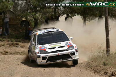 Kosti Katajamäki - Timo Alanne
53º BP Ultimate Acropolis Rally of Greece 2006. Ford Focus RS WRC '04 (EF04 WBW). Clasificado 26º.
Stobart VK Ford Rally Team

Del 2 al 4 de Junio, Athens.
Superficie: tierra.

El Rally constabade 3 etapas con un tenia un total de 1279.29 km de los que 355.62 km divididos en 18 tramos eran cronometrados.

Se inscribieron 91 equipos, tomaron la salida 84, finalizaron 69.

© Petr Sagner
@@
Palabras clave: Ford;Focus;WRC;Acropolis;Grecia;Atenas;2006