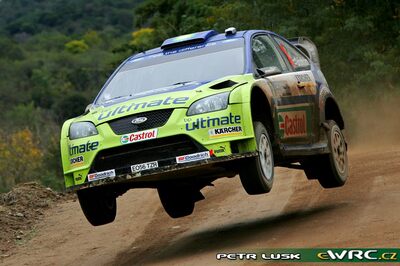 Marcus Grönholm - Timo Rautiainen
27º Rally Argentina 2007. Ford Focus RS WRC '06 (EO56 TZR). Clasificado 2º.
BP Ford World Rally Team

Del 4 al 6 de Junio, Carlos Paz, Córdoba.
Superficie: tierra.

El Rally constaba de 3 etapas con un total de 1284.85 km de los que 371.00 km divididos en 23 tramos, eran cronometrados. (7 de los 9 tramos de la 1ª etapa fueron cancelados, SS2 Capilla del Monte - San Marcos 1 de 22.95 km, SS3 San Marcos - Cuchi Corral 1 de 19.24 km, SS4 Villa Giardino - La Falda 1 de 15.50 km, SS5 Valle Hermoso - Casagrande 1 de 10.95 km, SS6 Cosquin - Tanti 1 de 11.27 km, SS7
Capilla del Monte - San Marcos 2 de 22.95 km y SS8 San Marcos - Cuchi Corral 2 de 19.24 km).

Tomaron la salida 70 equipos, finalizaron 41.

© Petr Lusk
@@
Palabras clave: Ford;Focus;WRC;Argentina;2007