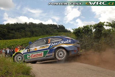 Marcus Grönholm - Timo Rautiainen
26º ADAC Rallye Deutschland 2007. Ford Focus RS WRC '07 (EU07 SSX). Clasificado 4º.
BP Ford World Rally Team

Del 17 al 19 de Agosto, Trier.
Superficie: asfalto.

El Rally constaba de 3 etapas con un total de 1227.04 km de los que 356.27 km divididos en 19 tramos, eran cronometrados.

Tomaron la salida 102 equipos, finalizaron 88.

© Marek Felt
@@
Palabras clave: Ford;Focus;WRC;Alemania;2007