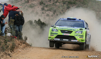 Marcus Grönholm - Timo Rautiainen
41º Vodafone Rally de Portugal 2007. Ford Focus RS WRC '06 (EJ56 FZV). Clasificado 4º.
BP Ford World Rally Team

Del 30 de Marzo al 1 de Abril, Faro.
Superficie: tierra.

El Rally constaba de 3 etapas con un total de 1009.31 km de los que 357.10 km divididos en 18 tramos, eran cronometrados.

Tomaron la salida 80 equipos, finalizaron 61.

© Petr Sagner
@@
Palabras clave: ;Ford;Focus;WRC;Portugal;2007