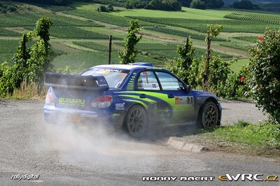 Petter Solberg - Phil Mills
26º ADAC Rallye Deutschland 2007. Subaru Impreza S12B WRC '07 (JT56 SRT). Clasificado 6º.
Subaru World Rally Team

Del 17 al 19 de Agosto, Trier.
Superficie: asfalto.

El Rally constaba de 3 etapas con un total de 1227.04 km de los que 356.27 km divididos en 19 tramos, eran cronometrados.

Tomaron la salida 102 equipos, finalizaron 88.

© Ronny Baert
@
Palabras clave: Subaru;Impreza;WRC;Alemania;2007