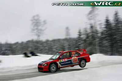 Xavier Pons - Xavier Amigo
22º Rally Norway 2007. Mitsubishi Lancer WRC 05 (KN04 WMC). Clasificado 16º.
MMSP LTD

Del 16 al 18 de Febrero, Hamar, Innlandet.
Superficie: nieve - hielo.

El Rally constaba de 3 etapas con un total de 1109.57 km de los que 355.99 km divididos en 18 tramos, eran cronometrados.

Tomaron la salida 74 equipos, finalizaron 63.

© Petr Lusk
@@
Palabras clave: Mitsubishi;Lancer;WRC;Noruega;2007;Nieve