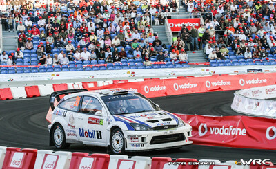 Guy Wilks - Phil Pugh
41º Vodafone Rally de Portugal 2007. Ford Focus RS WRC '05 (ET53 URO). Abandonó por avería mecánica en SS3 Serra de Tavira 1 de 24.38 km.
Ramsport

Del 30 de Marzo al 1 de Abril, Faro.
Superficie: tierra.

El Rally constaba de 3 etapas con un total de 1009.31 km de los que 357.10 km divididos en 18 tramos, eran cronometrados.

Tomaron la salida 80 equipos, finalizaron 61.

© Petr Sagner
@@
Palabras clave: Ford;Focus;WRC;Portugal;2007