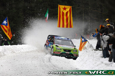 Jari-Matti Latvala - Miikka Anttila
57º Uddeholm Swedish Rally 2008. Ford Focus RS WRC '07 (EU07 SUF). Clasificado 1º.
BP Ford Abu Dhabi WRT

Del 8 al 10 de Febrero, Karlstad.
Superficie: nieve - hielo.

El Rally tenia un total de 1408.94 km de los que 340.24 km divididos en 3 etapas y 20 tramos eran cronometrados.

Tomaron la salida 61 equipos, finalizaron 49.

© Marek Felt
@
Palabras clave: ;Ford;Focus;WRC;Suecia;2008;Nieve