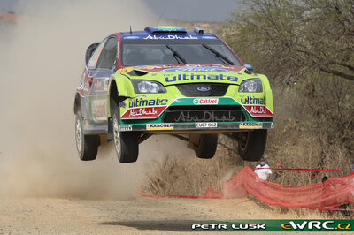 Mikko Hirvonen - Jarmo Lehtinen
5º Corona Rally Mexico 2008. Ford Focus RS WRC '07 (EU07 SSZ). Clasificado 4º.
BP Ford Abu Dhabi WRT

Del 28 de Febrero al 2 de Marzo, León.
Superficie: tierra.

El Rally tenia un total de 808.53 km de los que 353.75 km divididos en 3 etapas y 20 tramos eran cronometrados (1 de ellos fue cancelado SS18 Guanajuatito de 22.3 km).

Tomaron la salida 40 equipos, finalizaron 28.

© Petr Lusk
@@
Palabras clave: ;Ford;Focus;WRC;Mexico;2008
