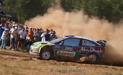 Mikko Hirvonen - Jarmo Lehtinen
56º Acropolis Rally of Greece 2009. Ford Focus RS WRC 09 (PX08 AXB). Clasificado 1º.

Del 11 al 14 de Junio, Loutraki, Grecia.
Superficie: tierra.

El Rally tenia un total de 1178.17 Km de los que 371.02 Km divididos en 17 tramos eran especiales (2 de ellas fueron canceladas SS3 Evangelistria de 21.03 Km y SS16 Loutraki 2 de 8.98 Km).

Se inscribieron 47 equipos, tomaron la salida 45, finalizaron 33.

© Martin Stanislav
@
Palabras clave: ;Acropolis;Grecia;Ford;Focus;WRC;2009