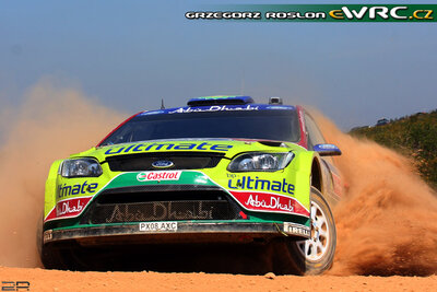Mikko Hirvonen - Jarmo Lehtinen
43º Vodafone Rally de Portugal 2009. Ford Focus RS WRC '08 (PX08 AXC). Clasificado 2º.
BP Ford Abu Dhabi WRT

Del 2 al 5 de Abril, Faro.
Superficie: tierra.

El Rally tenia un total de 1164.99 km de los que 361.36 km divididos en 3 etapas y18 tramos eran cronometrados.

Tomaron la salida 70 equipos, finalizaron 41.

© Greg Roslon
@@
Palabras clave: ;Ford;Focus;WRC;Portugal;2009