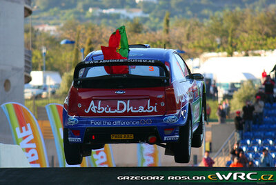 Mikko Hirvonen - Jarmo Lehtinen
43º Vodafone Rally de Portugal 2009. Ford Focus RS WRC '08 (PX08 AXC). Clasificado 2º.
BP Ford Abu Dhabi WRT

Del 2 al 5 de Abril, Faro.
Superficie: tierra.

El Rally tenia un total de 1164.99 km de los que 361.36 km divididos en 3 etapas y18 tramos eran cronometrados.

Tomaron la salida 70 equipos, finalizaron 41.

© Greg Roslon
@@
Palabras clave: ;Ford;Focus;WRC;Portugal;2009