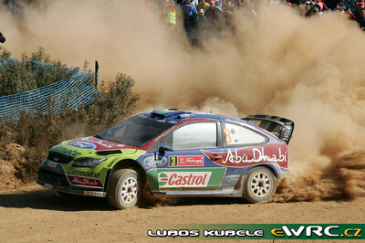 Mikko Hirvonen - Jarmo Lehtinen
43º Vodafone Rally de Portugal 2009. Ford Focus RS WRC '08 (PX08 AXC). Clasificado 2º.
BP Ford Abu Dhabi WRT

Del 2 al 5 de Abril, Faro.
Superficie: tierra.

El Rally tenia un total de 1164.99 km de los que 361.36 km divididos en 3 etapas y18 tramos eran cronometrados.

Tomaron la salida 70 equipos, finalizaron 41.

© Luboš Kubele
@@
Palabras clave: ;Ford;Focus;WRC;Portugal;2009