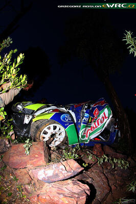 Jari-Matti Latvala - Miikka Anttila
43º Vodafone Rally de Portugal 2009. Ford Focus RS WRC '08 (PX08 AXD). Abandonó por accidente en SS4 Malhão 1 de 22.04 km.
BP Ford Abu Dhabi WRT

Del 2 al 5 de Abril, Faro.
Superficie: tierra.

El Rally tenia un total de 1164.99 km de los que 361.36 km divididos en 3 etapas y18 tramos eran cronometrados.

Tomaron la salida 70 equipos, finalizaron 41.

© Greg Roslon
@@
Palabras clave: ;Ford;Focus;Portugal;2009;Crash