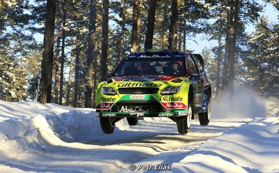 Mikko Hirvonen - Jarmo Lehtinen
58º Rally Sweden 2010. Ford Focus RS WRC '09 (BK08 LCW). Clasificado 1º.

Del 10 al 14 de Febrero, Karlstad, Suecia.
Superficie: nieve - hielo.

El Rally tenia un total de 1879.23 km de los que 345.15 km divididos en 3 etapas y 21 tramos eran cronometrados.

Tomaron la salida 55 equipos, finalizaron 43.

© Petr Eliáš
@
Palabras clave: ;Ford;Focus;WRC;Suecia;2010;Nieve