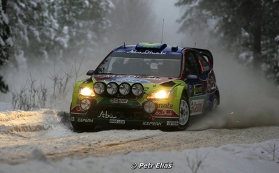 Mikko Hirvonen - Jarmo Lehtinen
58º Rally Sweden 2010. Ford Focus RS WRC '09 (BK08 LCW). Clasificado 1º.

Del 10 al 14 de Febrero, Karlstad, Suecia.
Superficie: nieve - hielo.

El Rally tenia un total de 1879.23 km de los que 345.15 km divididos en 3 etapas y 21 tramos eran cronometrados.

Tomaron la salida 55 equipos, finalizaron 43.

© Petr Eliáš
@
Palabras clave: ;Ford;Focus;WRC;Suecia;2010;Nieve