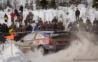 Mikko Hirvonen - Jarmo Lehtinen
58º Rally Sweden 2010. Ford Focus RS WRC '09 (BK08 LCW). Clasificado 1º.

Del 10 al 14 de Febrero, Karlstad, Suecia.
Superficie: nieve - hielo.

El Rally tenia un total de 1879.23 km de los que 345.15 km divididos en 3 etapas y 21 tramos eran cronometrados.

Tomaron la salida 55 equipos, finalizaron 43.

© Robert Tuchowski
@
Palabras clave: ;Ford;Focus;WRC;Suecia;2010;Nieve