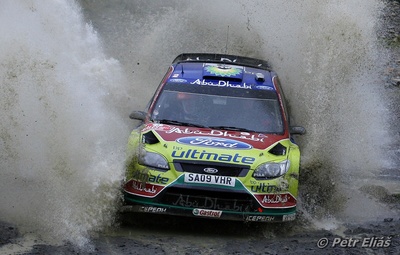 Mikko Hirvonen - Jarmo Lehtinen
66º Wales Rally GB 2010. Ford Focus RS WRC '09 (SA09 VHR). Clasificado 4º.

Del 10 al 14 de Noviembre, Cardiff.
Superficie: tierra.

El Rally teni­a un total de 1598.74 km de los que 344.66 km divididos en 3 etapas y 20 tramos eran cronometrados.

Se inscribieron 63 equipos, tomaron la salida 61, finalizaron 45.

© Petr Eliáš
@
Palabras clave: ;Ford;Focus;WRC;Gran_Bretaña;2010