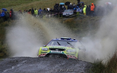 Mikko Hirvonen - Jarmo Lehtinen
66º Wales Rally GB 2010. Ford Focus RS WRC '09 (SA09 VHR). Clasificado 4º.

Del 10 al 14 de Noviembre, Cardiff.
Superficie: tierra.

El Rally teni­a un total de 1598.74 km de los que 344.66 km divididos en 3 etapas y 20 tramos eran cronometrados.

Se inscribieron 63 equipos, tomaron la salida 61, finalizaron 45.

© Petr Eliáš
@
Palabras clave: ;Ford;Focus;WRC;Gran_Bretaña;2010