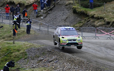 Mikko Hirvonen - Jarmo Lehtinen
66º Wales Rally GB 2010. Ford Focus RS WRC '09 (SA09 VHR). Clasificado 4º.

Del 10 al 14 de Noviembre, Cardiff.
Superficie: tierra.

El Rally teni­a un total de 1598.74 km de los que 344.66 km divididos en 3 etapas y 20 tramos eran cronometrados.

Se inscribieron 63 equipos, tomaron la salida 61, finalizaron 45.

© Petr Eliáš
@
Palabras clave: ;Ford;Focus;WRC;Gran_Bretaña;2010