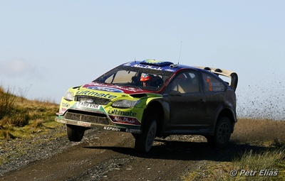 Mikko Hirvonen - Jarmo Lehtinen
66º Wales Rally GB 2010. Ford Focus RS WRC '09 (SA09 VHR). Clasificado 4º.

Del 10 al 14 de Noviembre, Cardiff.
Superficie: tierra.

El Rally teni­a un total de 1598.74 km de los que 344.66 km divididos en 3 etapas y 20 tramos eran cronometrados.

Se inscribieron 63 equipos, tomaron la salida 61, finalizaron 45.

© Petr Eliáš
@
Palabras clave: ;Ford;Focus;WRC;Gran_Bretaña;2010