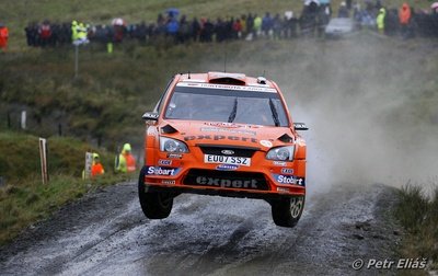 Henning Solberg - Stéphane Prévot
66º Wales Rally GB 2010. Ford Focus RS WRC '08 (EU07 SSZ). Clasificado 6º.

Del 10 al 14 de Noviembre, Cardiff.
Superficie: tierra.

El Rally teni­a un total de 1598.74 km de los que 344.66 km divididos en 3 etapas y 20 tramos eran cronometrados.

Se inscribieron 63 equipos, tomaron la salida 61, finalizaron 45.

© Petr Eliáš
@
Palabras clave: Henning_Solberg;Ford;Focus;WRC;Gran_Bretaña;2010