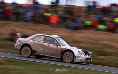 Mads Østberg - Jonas Andersson
66º Wales Rally GB 2010. Subaru Impreza S12B WRC '07 (FT56 SRT). Clasificado 9º.
Adapta AS

Del 10 al 14 de Noviembre, Cardiff.
Superficie: tierra.

El Rally teni­a un total de 1598.74 km de los que 344.66 km divididos en 3 etapas y 20 tramos eran cronometrados.

Se inscribieron 63 equipos, tomaron la salida 61, finalizaron 45.

© Petr Eliáš
@@
Palabras clave: Subaru;Impreza;WRC;Gran_Bretaña;2010