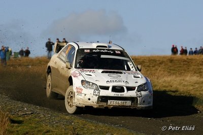 Mads Østberg - Jonas Andersson
66º Wales Rally GB 2010. Subaru Impreza S12B WRC '07 (FT56 SRT). Clasificado 9º.
Adapta AS

Del 10 al 14 de Noviembre, Cardiff.
Superficie: tierra.

El Rally teni­a un total de 1598.74 km de los que 344.66 km divididos en 3 etapas y 20 tramos eran cronometrados.

Se inscribieron 63 equipos, tomaron la salida 61, finalizaron 45.

© Petr Eliáš
@@
Palabras clave: Subaru;Impreza;WRC;Gran_Bretaña;2010