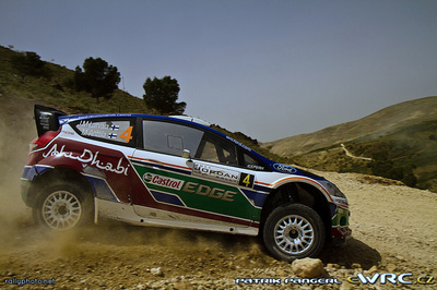 Jari-Matti Latvala - Miikka Anttila
3º Jordan Rally WRC 2011. Ford Fiesta RS WRC (PX60 AVM). Clasificado 2º.
Ford Abu Dhabi WRT

Del 14 al 16 de Abril, Jordania.
Superficie: tierra.

El Rally constaba de 3 etapas con un total de 935.41 km de los que 333.04 km divididos en 20 tramos eran cronometrados.
La primera etapa (6 tramos en total) fue cancelada debido a un retraso en el transporte del equipamiento de los equipos.

Tomaron la salida 36 equipos, finalizaron 23.

© Patrik Pangerl

Palabras clave: Ford;Fiesta;WRC;Jordania;2011
