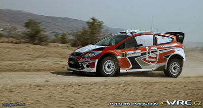 Federico Villagra- Jorge Perez Companc
3º Jordan Rally WRC 2011. Ford Fiesta RS WRC (PX60 AVO). Clasificado 7º.
Munchi's Ford WRT

Del 14 al 16 de Abril, Jordania.
Superficie: tierra.

El Rally constaba de 3 etapas con un total de 935.41 km de los que 333.04 km divididos en 20 tramos eran cronometrados.
La primera etapa (6 tramos en total) fue cancelada debido a un retraso en el transporte del equipamiento de los equipos. 

Tomaron la salida 36 equipos, finalizaron 23.

© Patrik Pangerl

Palabras clave: Ford;Fiesta;WRC;Jordania;2011