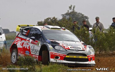 Martin Prokop - Zdenek Hruza
46º Vodafone Rally de Portugal 2012. Ford Fiesta RS WRC (06R 0030). Clasificado 5º.
Czech Ford National Team

Del 29 de Marzo al 1 de Marzo, Faro.
Superficie: tierra.

El Rally tenia un total de 1497.92 km de los que 434.77 km divididos en 4 etapas y 22 tramos eran cronometrados (3 de ellos fueron cancelados SS8 Tavira 2 de 25.0 km, SS9 Alcarias 2 de 25.2 km, SS10
São Brás de Alportel 2 de 16.2 km).

Tomaron la salida 51 equipos, finalizaron 30.

© Gonzalo Belay
@
Palabras clave: Martin_Prokop;Ford;Fiesta;WRC;Portugal;2012