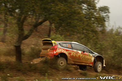 Martin Prokop - Zdenek Hruza
46º Vodafone Rally de Portugal 2012. Ford Fiesta RS WRC (06R 0030). Clasificado 5º.
Czech Ford National Team

Del 29 de Marzo al 1 de Marzo, Faro.
Superficie: tierra.

El Rally tenia un total de 1497.92 km de los que 434.77 km divididos en 4 etapas y 22 tramos eran cronometrados (3 de ellos fueron cancelados SS8 Tavira 2 de 25.0 km, SS9 Alcarias 2 de 25.2 km, SS10
São Brás de Alportel 2 de 16.2 km).

Tomaron la salida 51 equipos, finalizaron 30.

© Monica Parisotto
@
Palabras clave: ;Ford;Fiesta;WRC;Portugal;2012