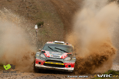 Martin Prokop - Zdenek Hruza
46º Vodafone Rally de Portugal 2012. Ford Fiesta RS WRC (06R 0030). Clasificado 5º.
Czech Ford National Team

Del 29 de Marzo al 1 de Marzo, Faro.
Superficie: tierra.

El Rally tenia un total de 1497.92 km de los que 434.77 km divididos en 4 etapas y 22 tramos eran cronometrados (3 de ellos fueron cancelados SS8 Tavira 2 de 25.0 km, SS9 Alcarias 2 de 25.2 km, SS10
São Brás de Alportel 2 de 16.2 km).

Tomaron la salida 51 equipos, finalizaron 30.

© Timo Anis
@
Palabras clave: ;Ford;Fiesta;WRC;Portugal;2012