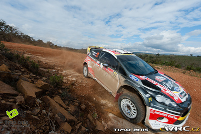 Martin Prokop - Zdenek Hruza
46º Vodafone Rally de Portugal 2012. Ford Fiesta RS WRC (06R 0030). Clasificado 5º.
Czech Ford National Team

Del 29 de Marzo al 1 de Marzo, Faro.
Superficie: tierra.

El Rally tenia un total de 1497.92 km de los que 434.77 km divididos en 4 etapas y 22 tramos eran cronometrados (3 de ellos fueron cancelados SS8 Tavira 2 de 25.0 km, SS9 Alcarias 2 de 25.2 km, SS10
São Brás de Alportel 2 de 16.2 km).

Tomaron la salida 51 equipos, finalizaron 30.

© Timo Anis
@
Palabras clave: ;Ford;Fiesta;WRC;Portugal;2012