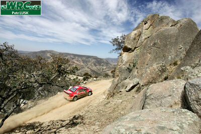 Marcus Grönholm - Timo Rautiainen
2º Corona Rally Mexico 2005. Peugeot 307 WRC (952 PRV 75). Clasificado 2º.
Marlboro Peugeot Total

Del 11 al 13 de Marzo, León.
Superficie: tierra.

El Rallye constaba de 3 etapas con un total de 928.74 km de los que 355.97 km divididos en 14 tramos eran cronometrados.

Tomaron la salida 38 equipos, finalizaron 28.

© Petr Lusk

Palabras clave: Peugeot;WRC;Mexico;2005