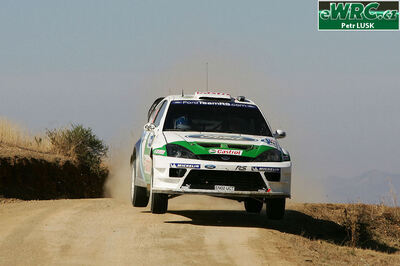 Toni Gardemeister - Jakke Honkanen
2º Corona Rally Mexico 2005. Ford Focus RS WRC '04 (EN02 UCT). Clasificado 6º.
BP Ford World Rally Team

Del 11 al 13 de Marzo, León.
Superficie: tierra.

El Rallye constaba de 3 etapas con un total de 928.74 km de los que 355.97 km divididos en 14 tramos eran cronometrados.

Tomaron la salida 38 equipos, finalizaron 28.

© Petr Lusk

Palabras clave: Ford;Focus;WRC;Mexico;2005