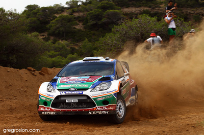 Mikko Hirvonen - Jarmo Lehtinen
57º Acropolis Rally 2011. Ford Fiesta RS WRC (PX60 AVJ). Clasificado 3º.
Ford Abu Dhabi WRT

Del 16 al 19 de Junio, Loutraki.
Superficie: tierra.

El Rallye constaba de 3 etapas con un total de 1217.82 km de los que 348.80 km divididos en 18 tramos eran cronometrados.

Tomaron la salida 42 equipos, finalizaron 35.

© Greg Roslon

Palabras clave: Ford;Fiesta;WRC;Acropolis;2011