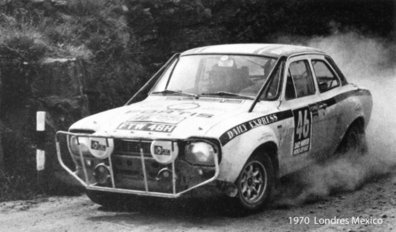 Rauno August Aaltonen - Henry Liddon
Daily Mirror London-Mexico World Cup Rally 1970. Ford Escort 1850 GT MKI (FTW 46H). Clasificado 3º.

Anécdota:
Llegando a Montevideo fue requerido por un policia a perseguir un coche que habia atropellado a un ciclista. El policia disparaba por la ventanilla hasta que una bala revento la rueda del coche perseguido.

Del 19 de Abril al 27 de Mayo, Londres - Mexico.
Superficie: tierra - asfalto.

ITINERARIO:
Reino Unido, Francia, Alemania Occidental, Austria, Hungría, Yugoslavia, Bulgaria, regreso a Yugoslavia, Italia, Sur de Francia, España, Portugal.
REINICIO:
Brasil, Uruguay, Argentina, Chile, regreso a Argentina, Bolivia, Perú, Ecuador, Colombia, Panamá, Costa Rica, Nicaragua, Honduras, El Salvador, Guatemala y México.

La prueba constaba de 29 tramos especiales con un total de 25.750.00 km incluyendo los tramos de enlace.

Tomaron la salida 96 equipos, finalizaron 26.

Foto 2 de 2
@
Palabras clave: Rauno_August_Aaltonen;Henry_Liddon;Londres-Mexico;Ford;Escort;1970